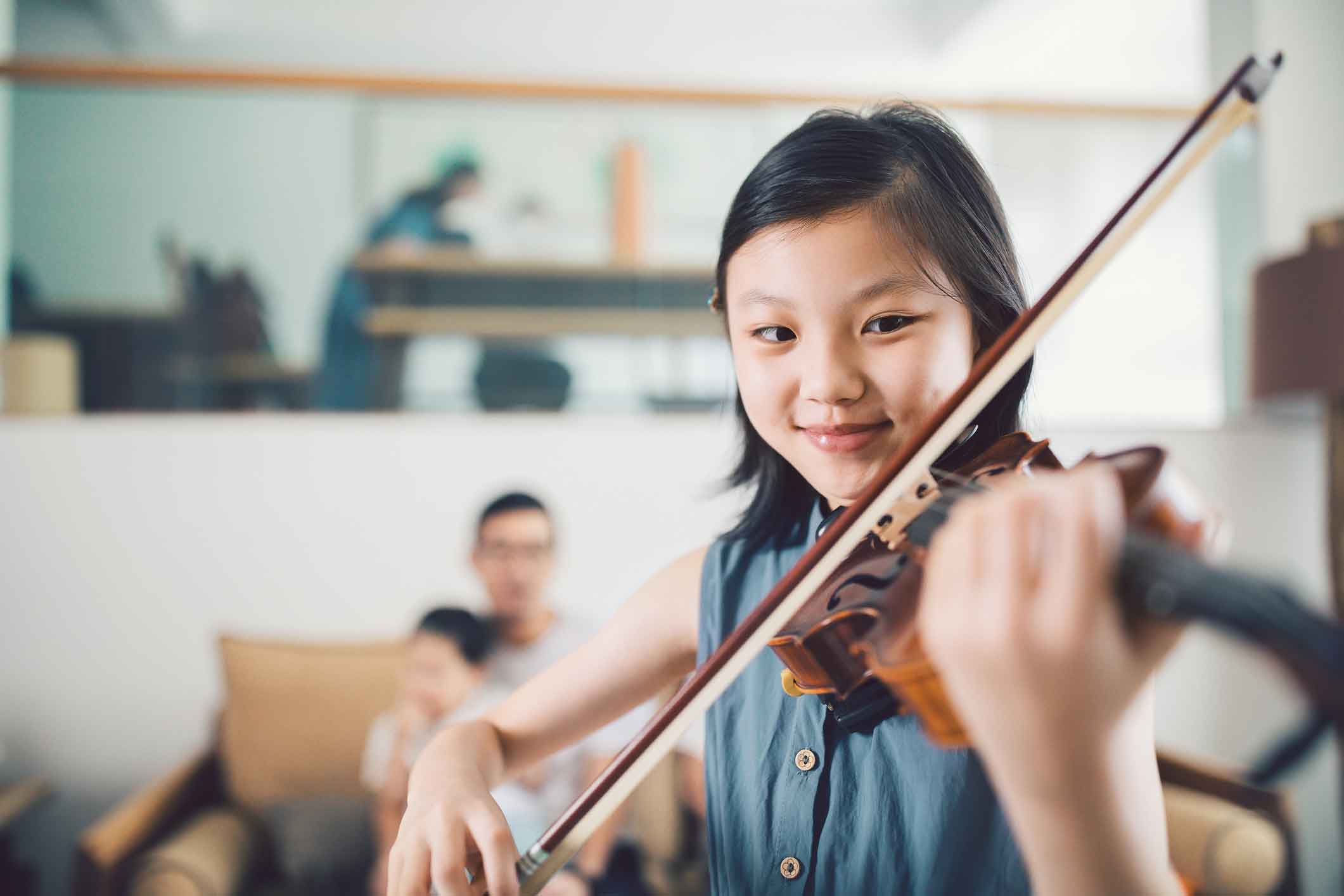 Family finances: enrichment and violin lessons add to the cost of raising a child in Singapore