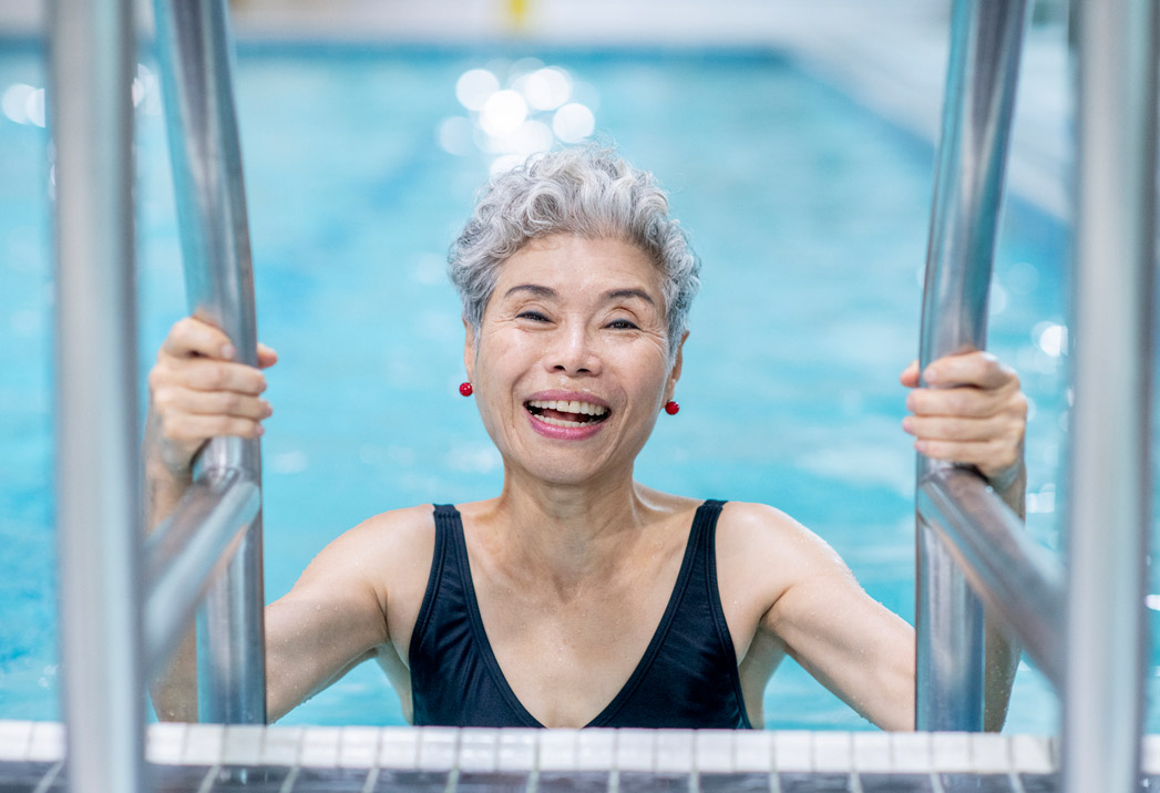 Senior lady in swimming pool